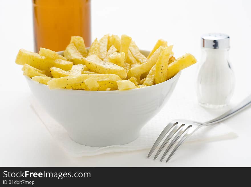 Bowl of homemade chips isolation on a white background