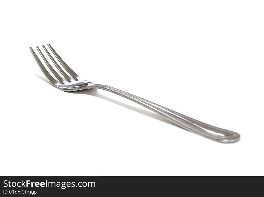 A macro shot of an isolated fork. A macro shot of an isolated fork.