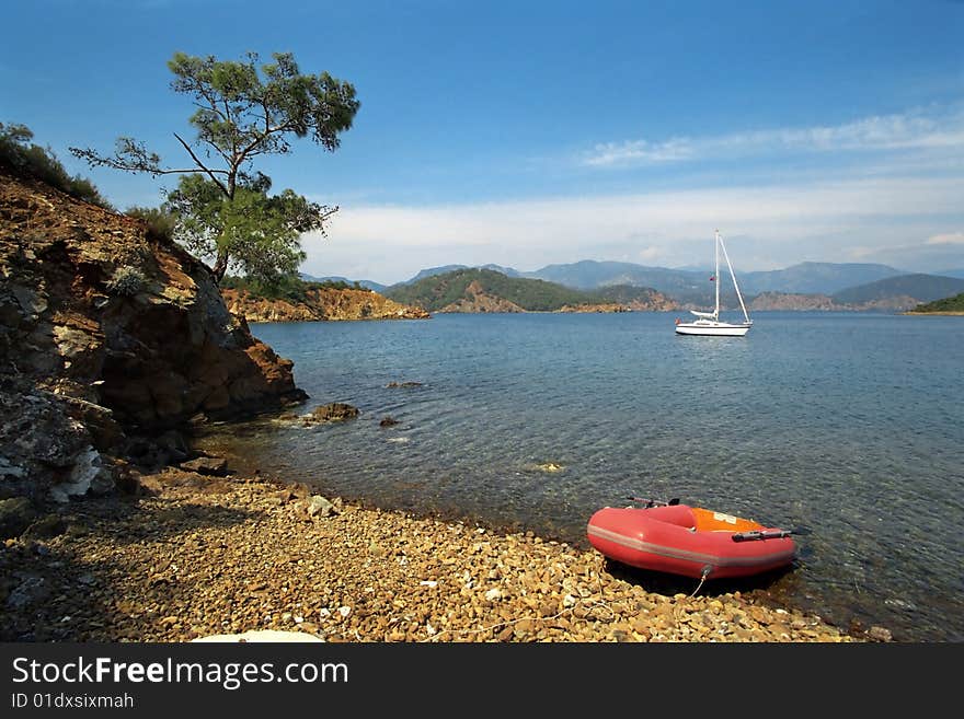 Anchoring yacht at beautiful coast in mediteranian sea. Anchoring yacht at beautiful coast in mediteranian sea