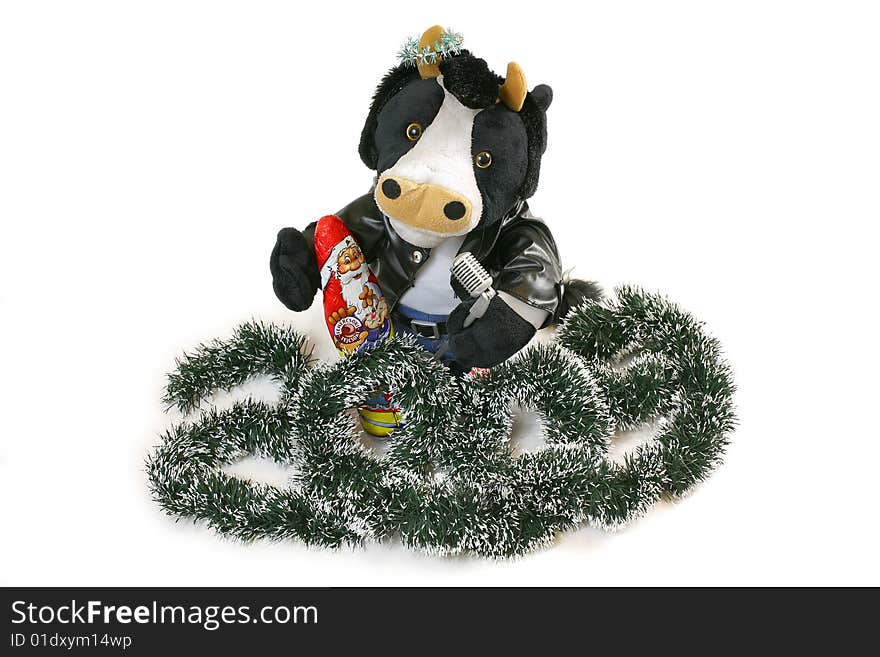 Singing Toy Bull Holding Chocolate Santa Claus and The Xmas Tree Adornment Arranged as 2009. Singing Toy Bull Holding Chocolate Santa Claus and The Xmas Tree Adornment Arranged as 2009