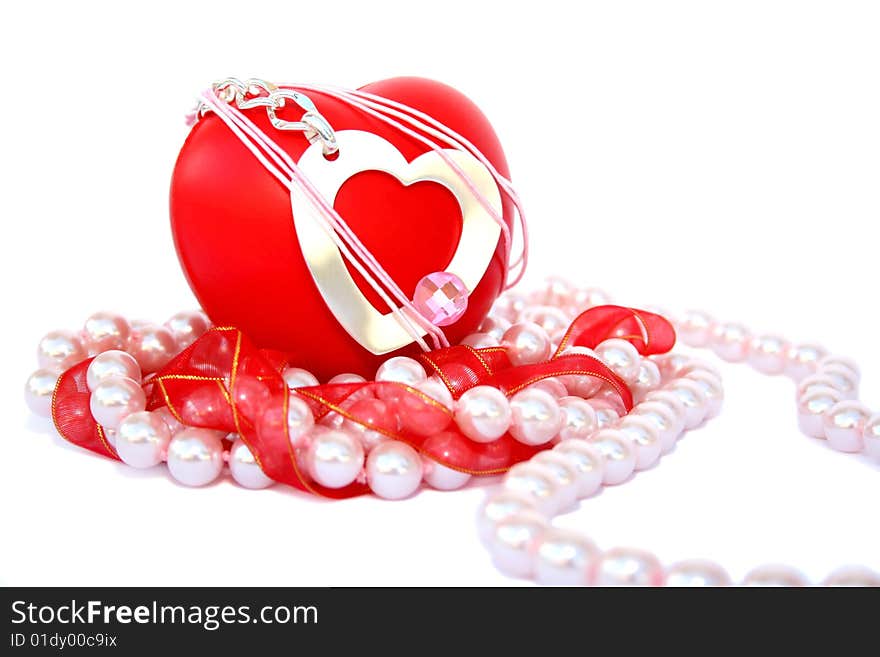 Valentine hearts,red ribbon,pink pearls on white background.