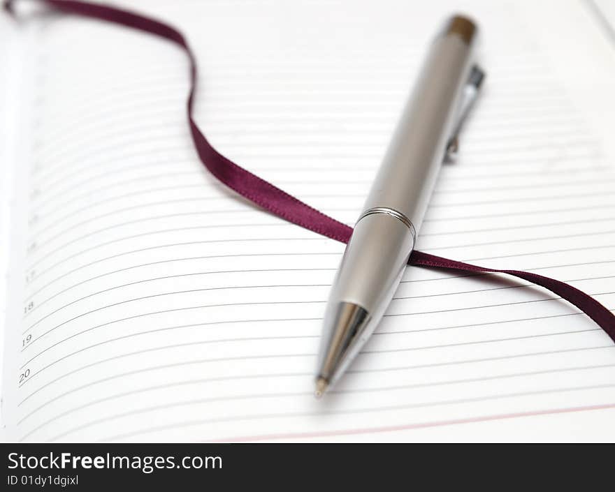 Striped paper(diary) with pen and bookmark. Striped paper(diary) with pen and bookmark