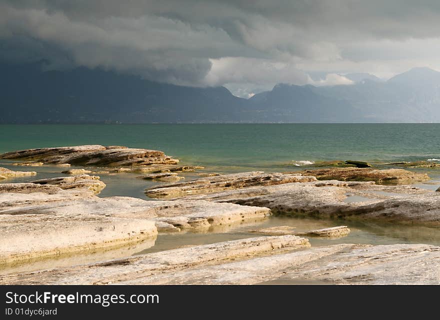 Landscape with lake and clouds