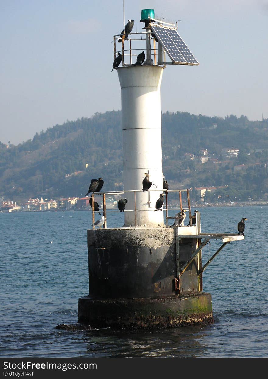 The little lighthouse locaded in the middle of the Bosphorus, you can see the Asian shore