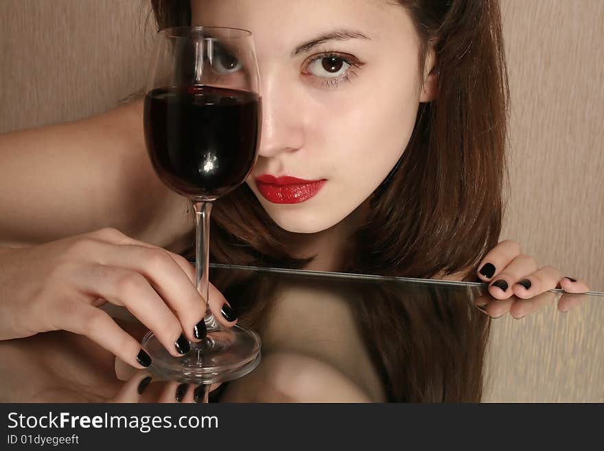 Portrait of the girl with a glass of wine. Portrait of the girl with a glass of wine.