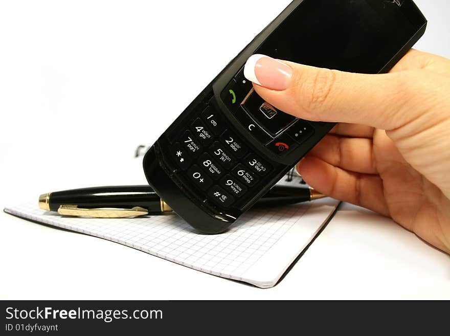 Woman hand holding mobile phone