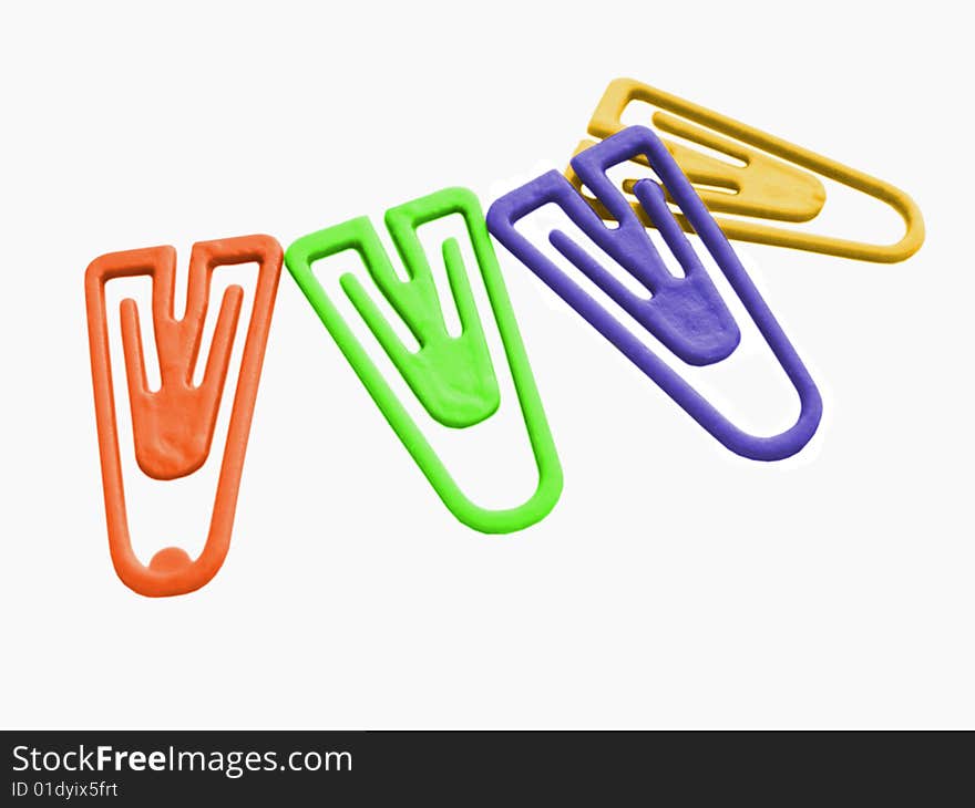 Plastic color paperclips on a white background isolated