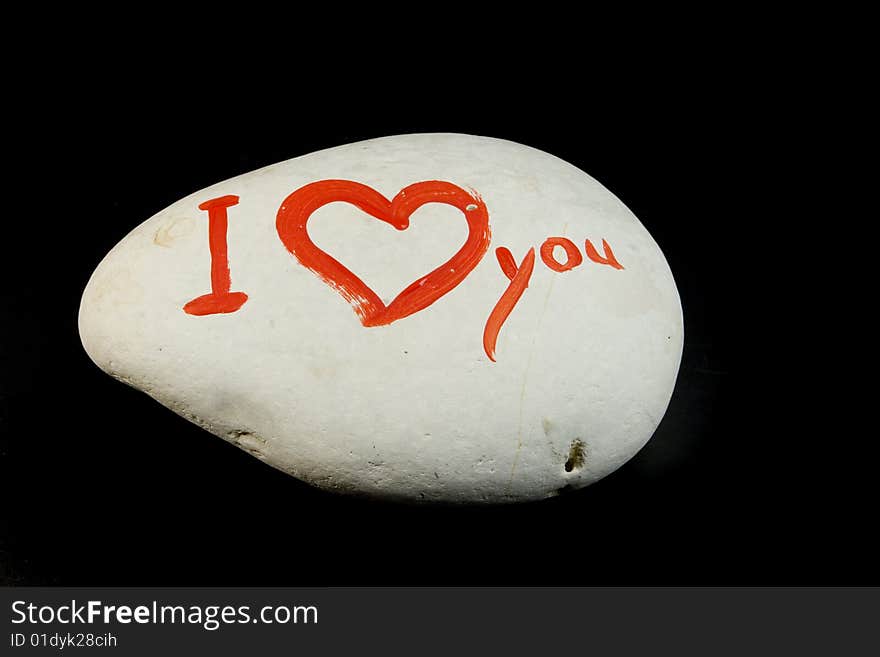 I love You on white stone on black ground