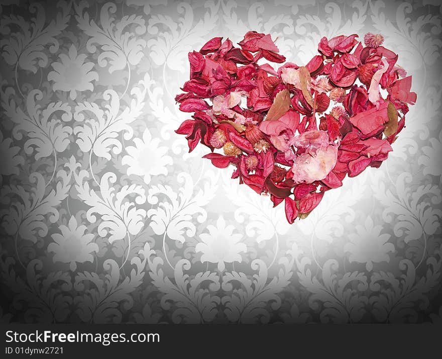 Heart made of petals of roses on the Renaissance background