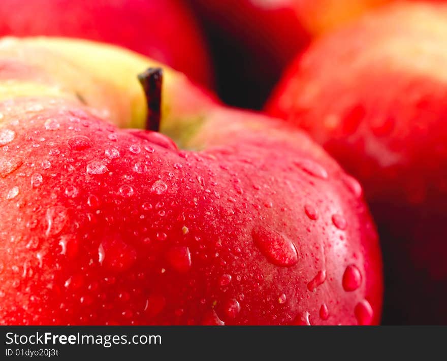 Close-up of red apples with water drops