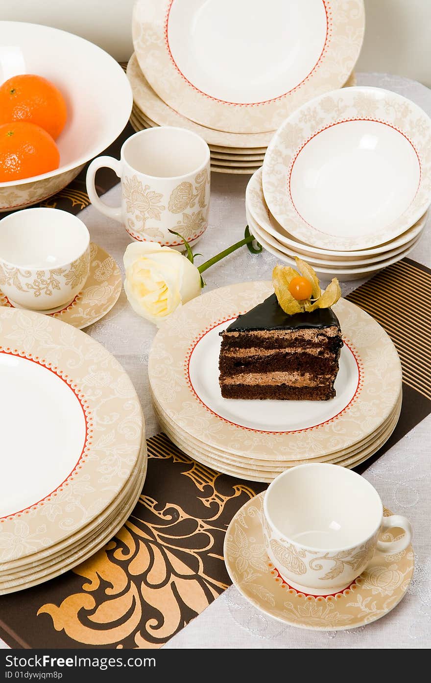 Still-life with cake and dishes