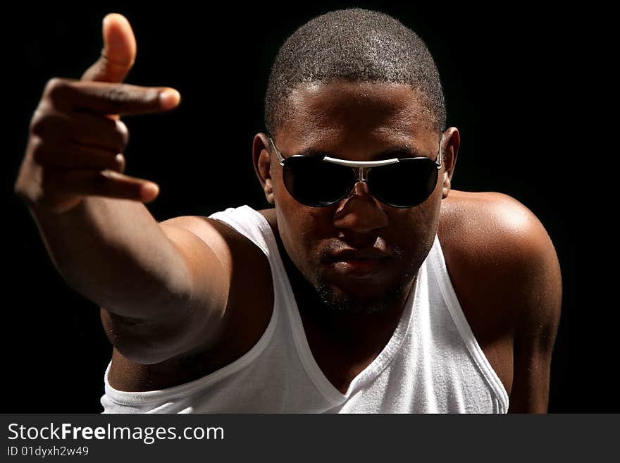 Young african american male on black background