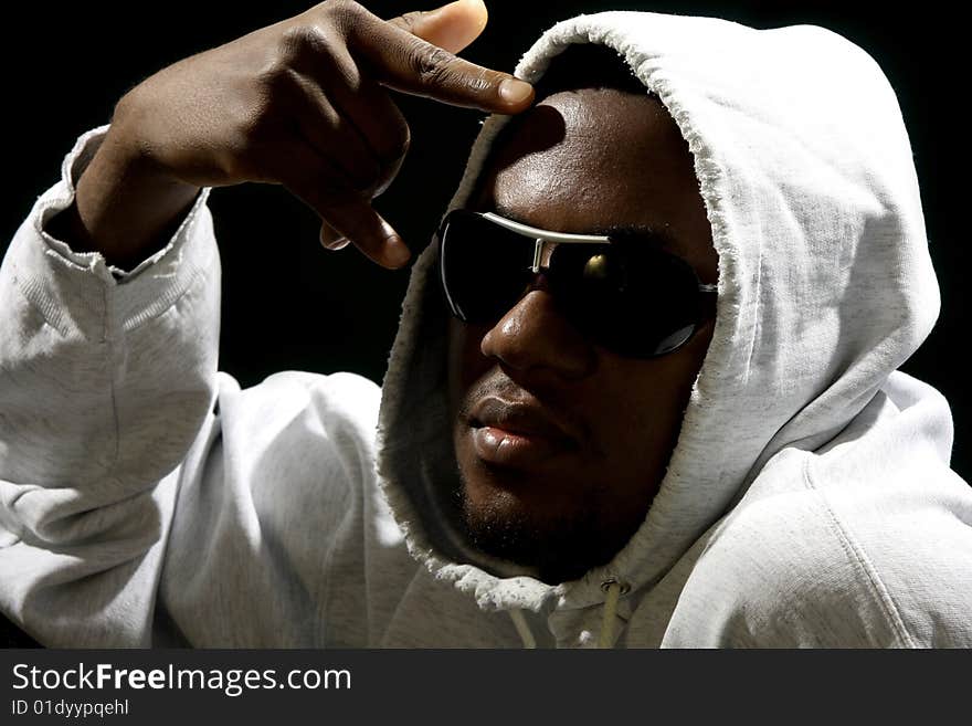 Young african american male on black background