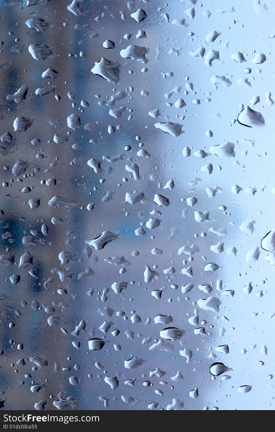 Raindrops on the glass background