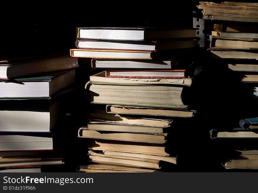 Piles of books in library. Piles of books in library