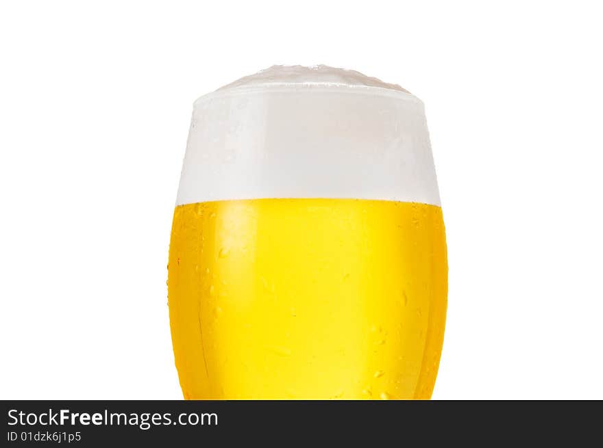 Detail of glass of cold beer with water drops isolated on white background. Detail of glass of cold beer with water drops isolated on white background