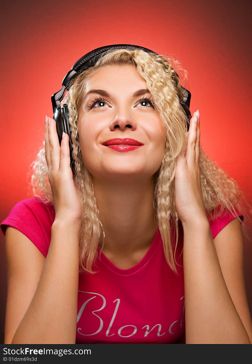 Blond woman listening to the music