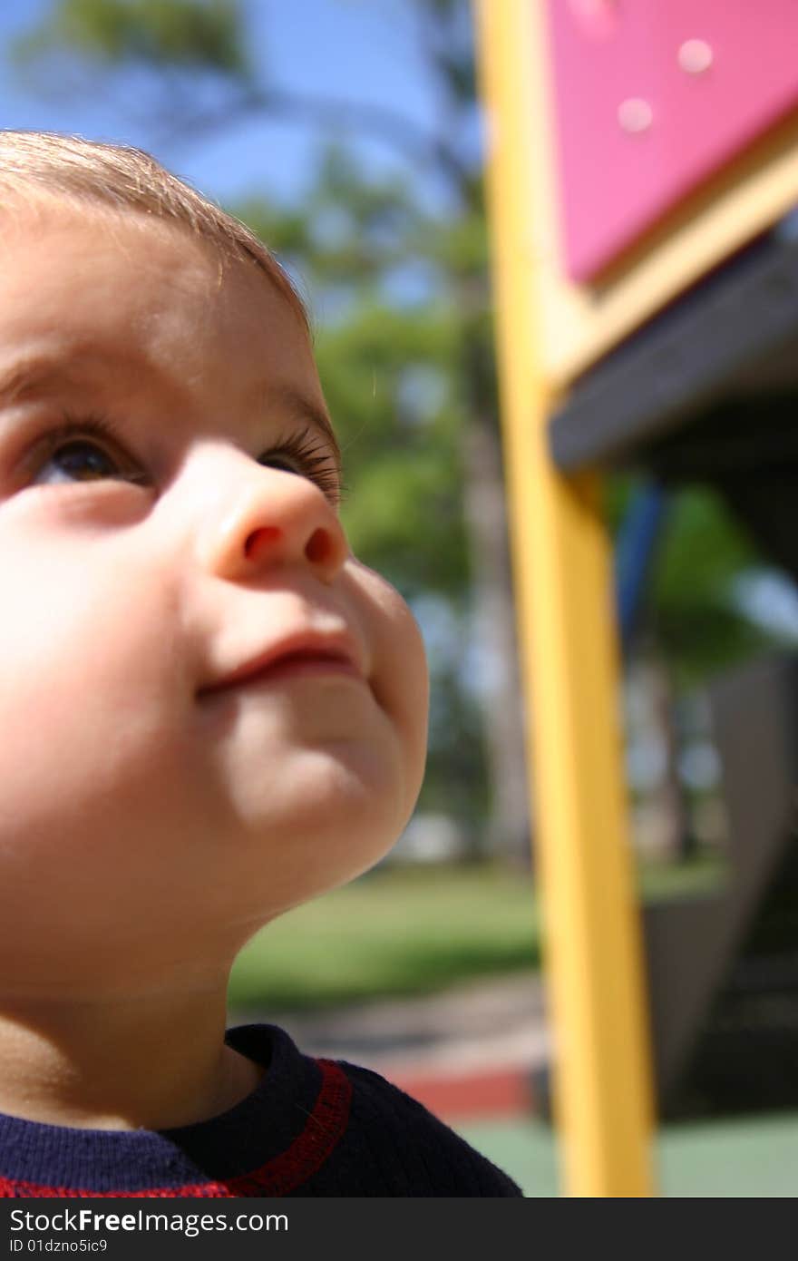 A toddler playing at the local park and having fun. A toddler playing at the local park and having fun.