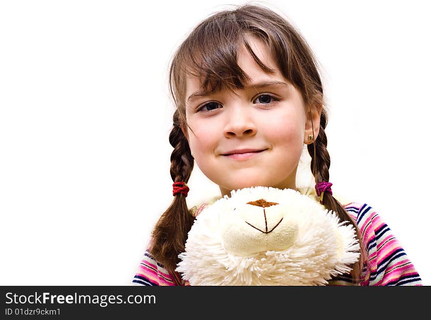 Closeup portrait of a young girl looking looking straight ahead. Closeup portrait of a young girl looking looking straight ahead.