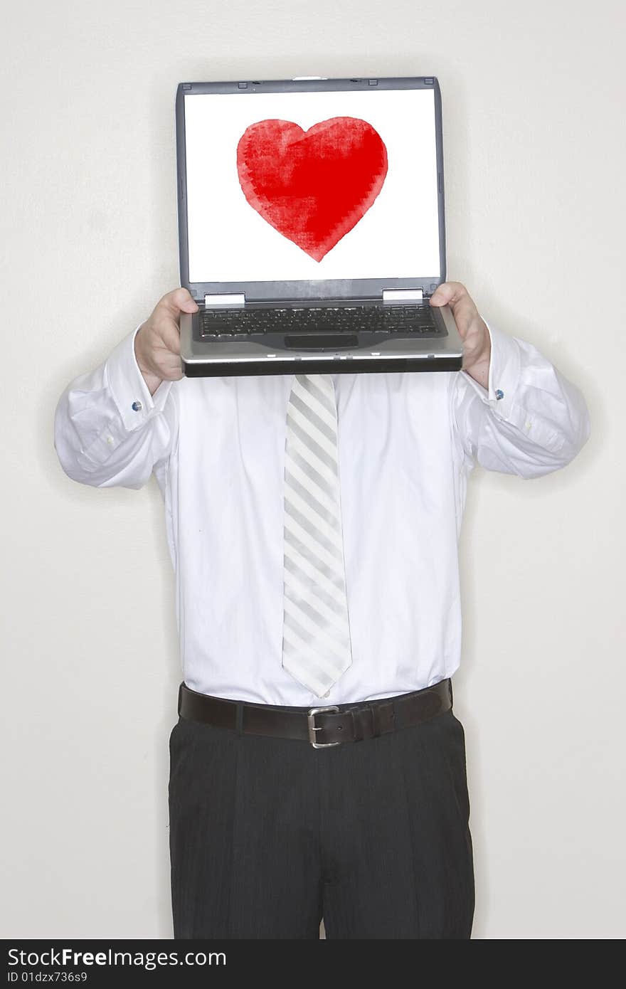 Businessman Holding Laptop with heart