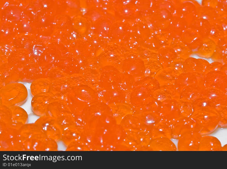 Red Caviar delicacy macro on a white background