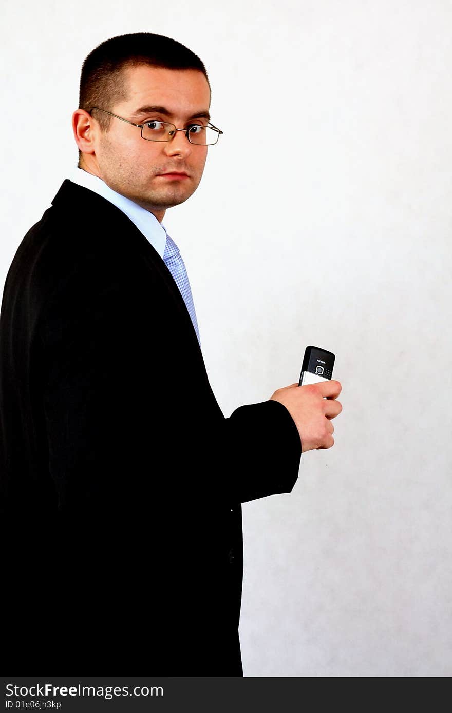 Young businessman on isolated background