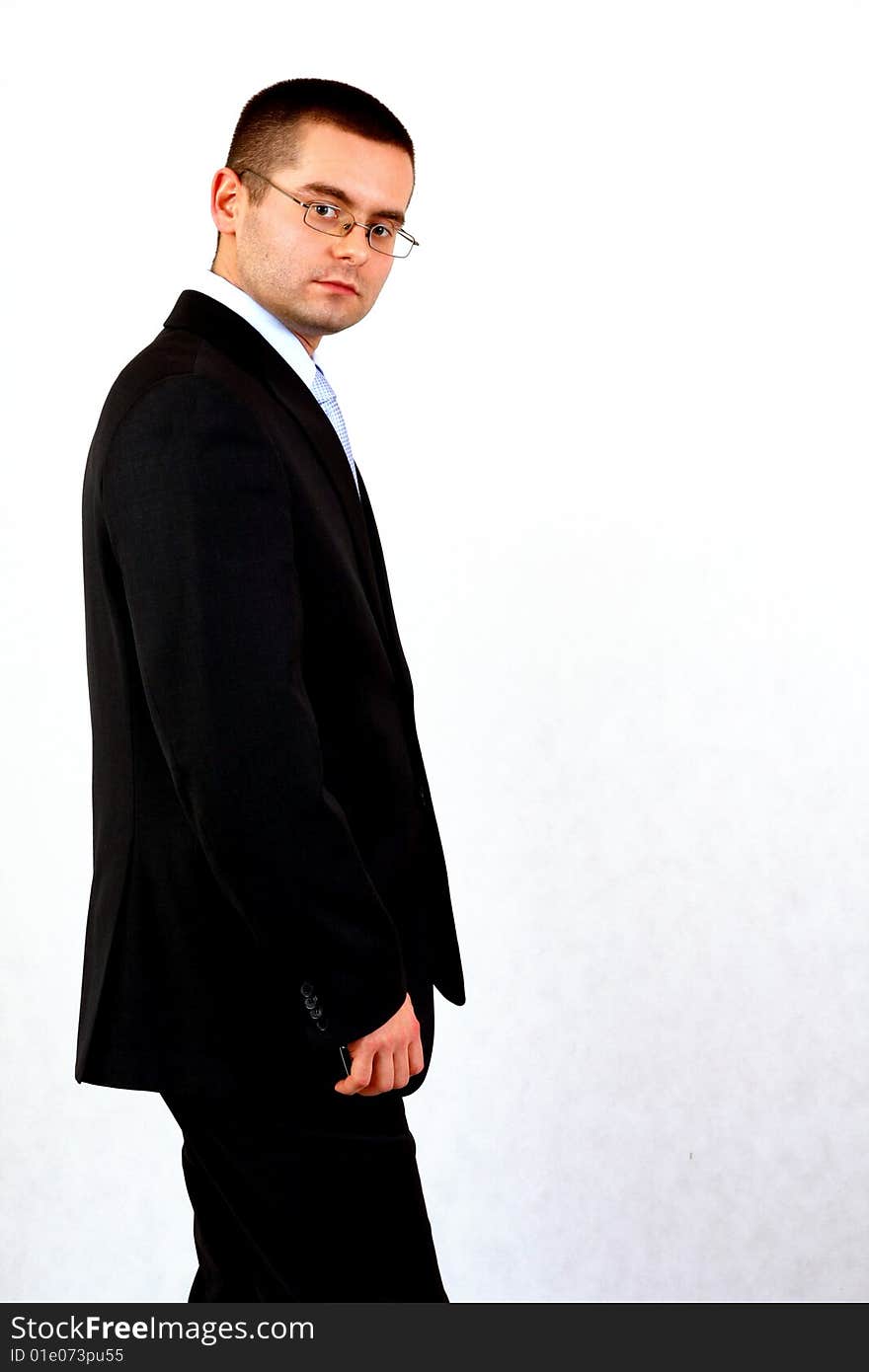 Young businessman on isolated background