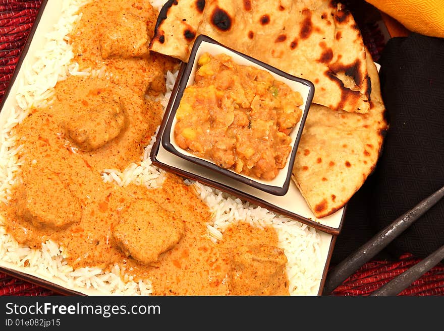 Tandoori Roti, Samosa Chaat, Lamb Korma. Tandoori Roti, Samosa Chaat, Lamb Korma