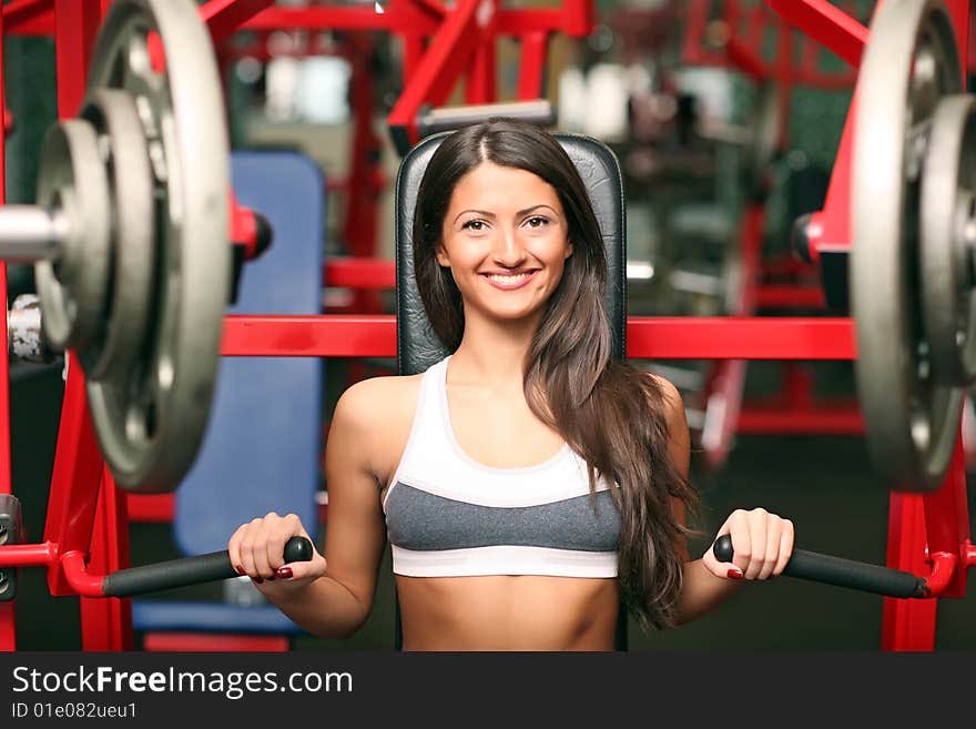 The beautiful girl in sports club. Look other photos of this series: