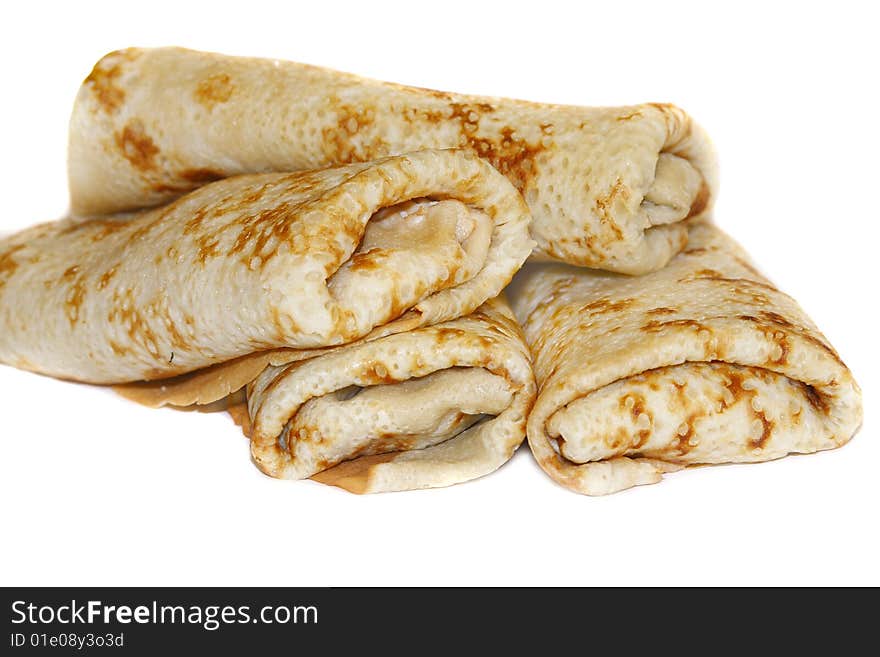 Pancakes with filling  on a white background. Pancakes with filling  on a white background