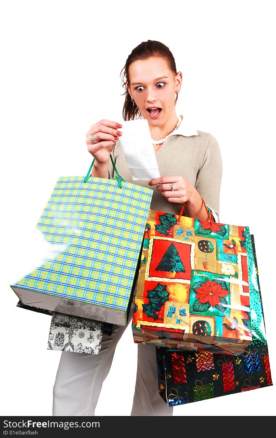 A young woman back from an shopping spree realized that she spend much to mach money in the stores. A young woman back from an shopping spree realized that she spend much to mach money in the stores.