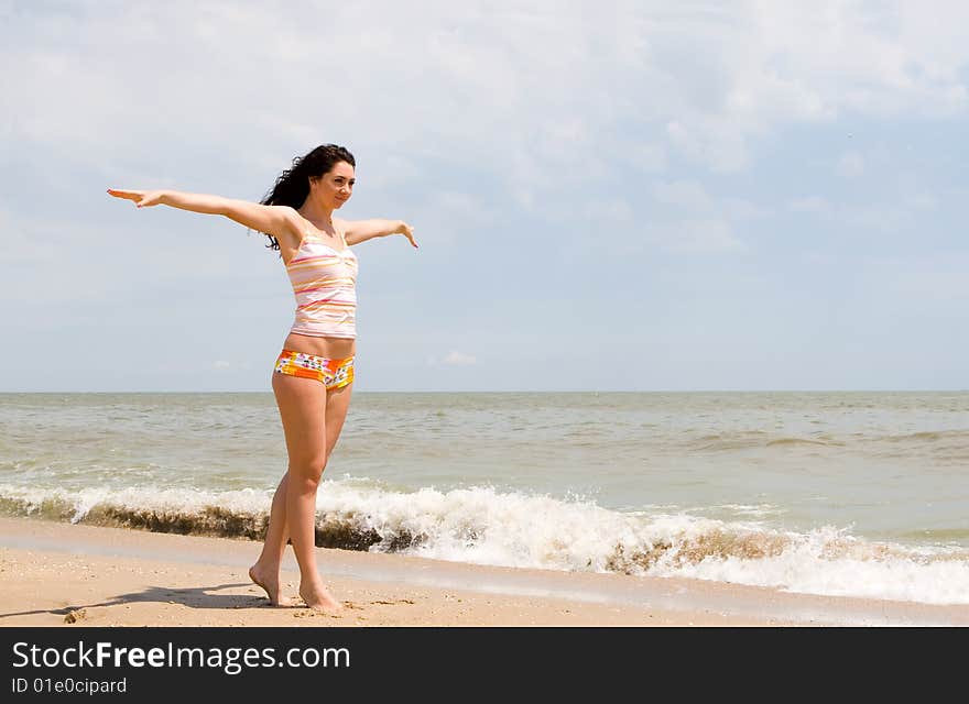 Happy woman dreams to fly on winds