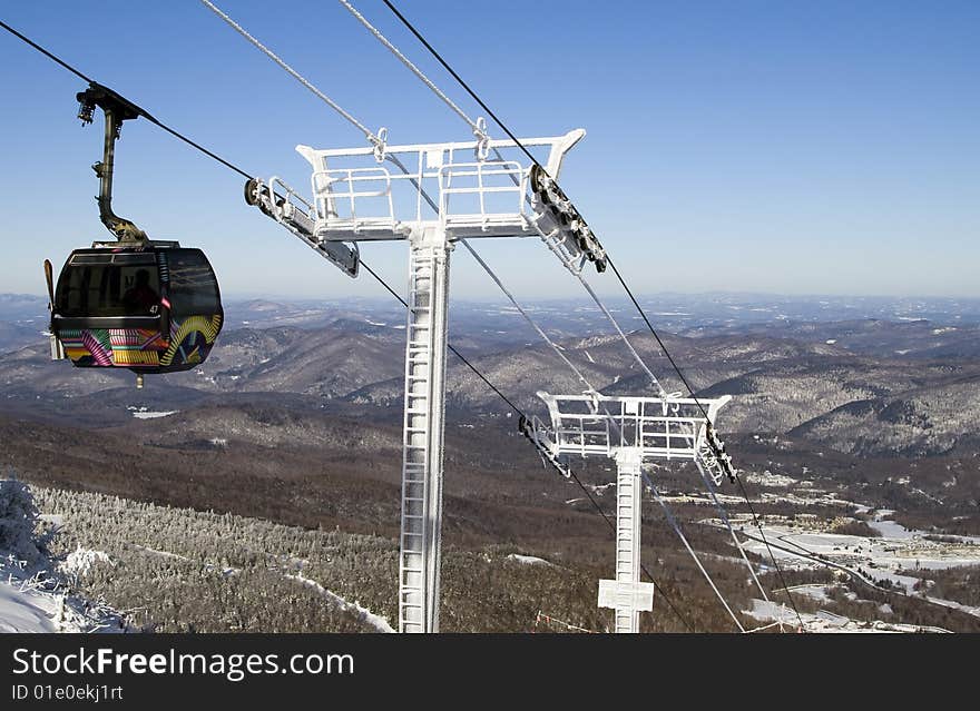 Line of gondolas in a ski resort