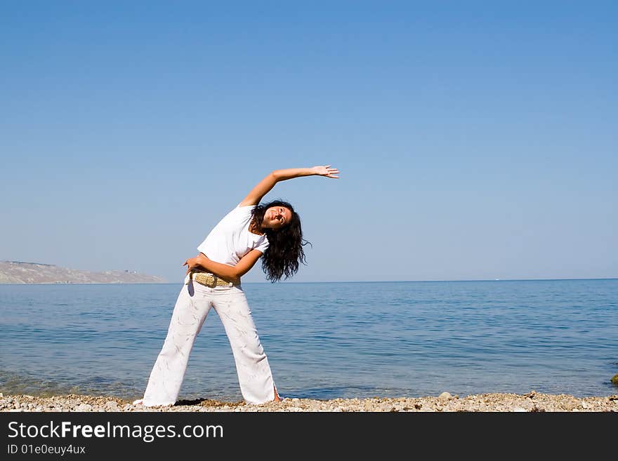 Fitness woman on the beach