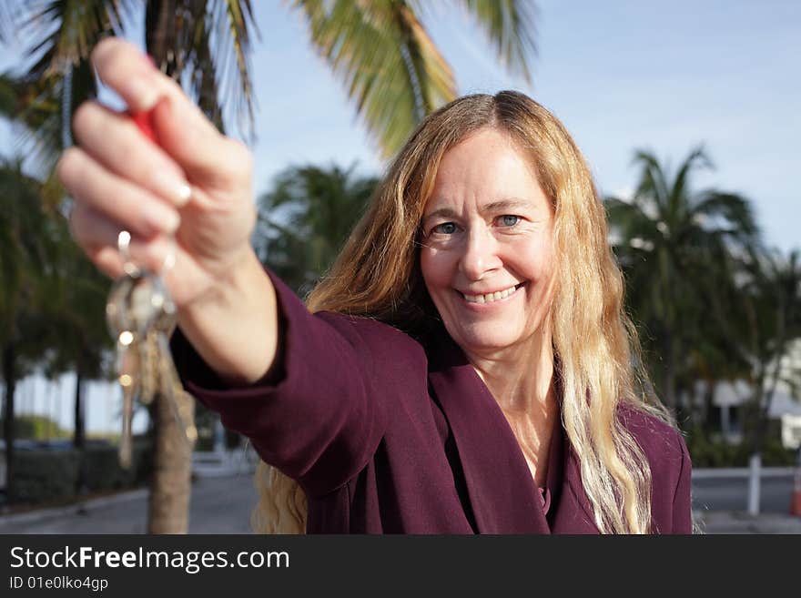 Woman holding a set of keys