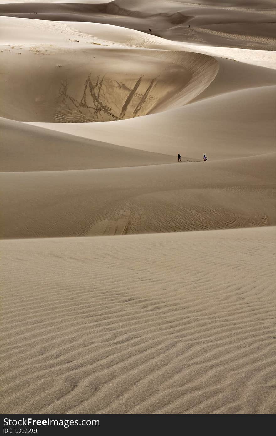 Walking the dunes - Great Sand Dunes National Park, Colorado. Walking the dunes - Great Sand Dunes National Park, Colorado.