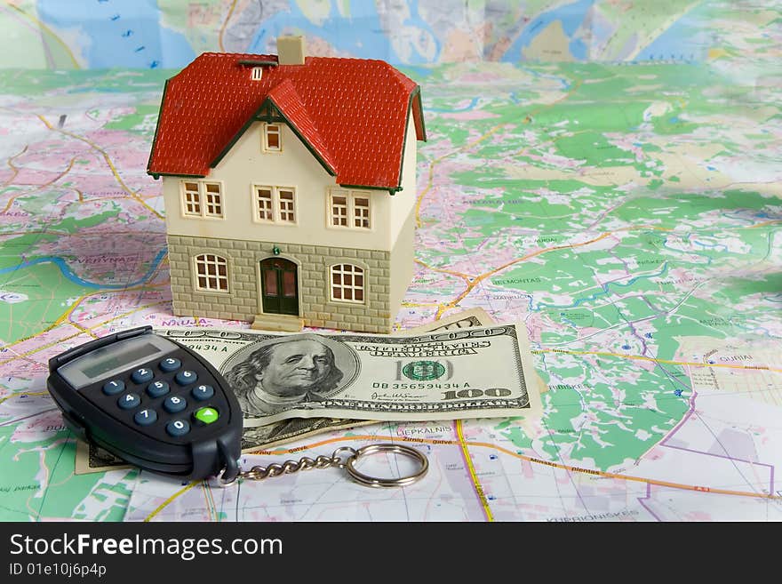 Miniature House on Money. Part of Series. See Portfolio For Similar Images