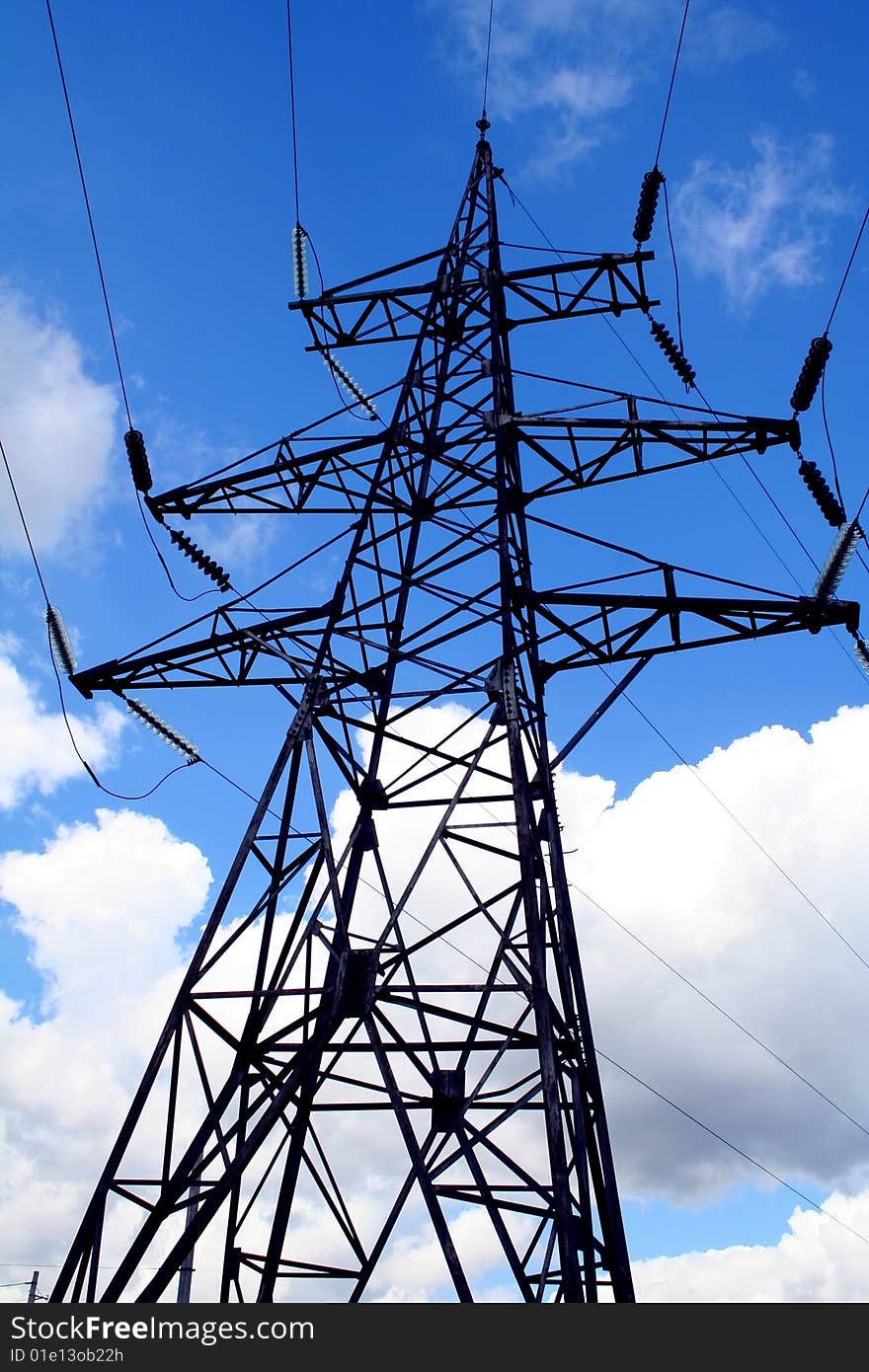 Electrical tower on a background of the blue sky