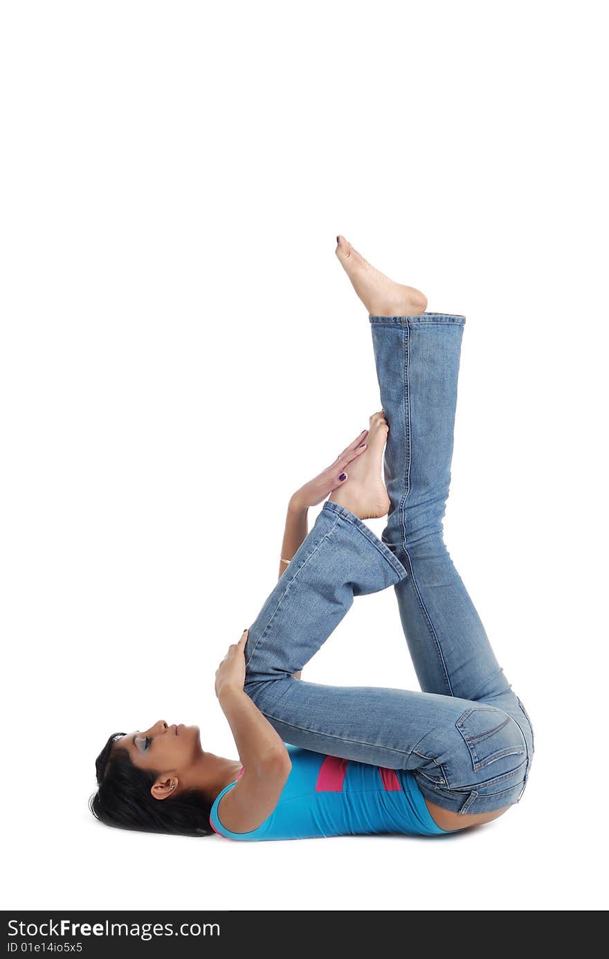 Girl posing on the floor isolated over white background