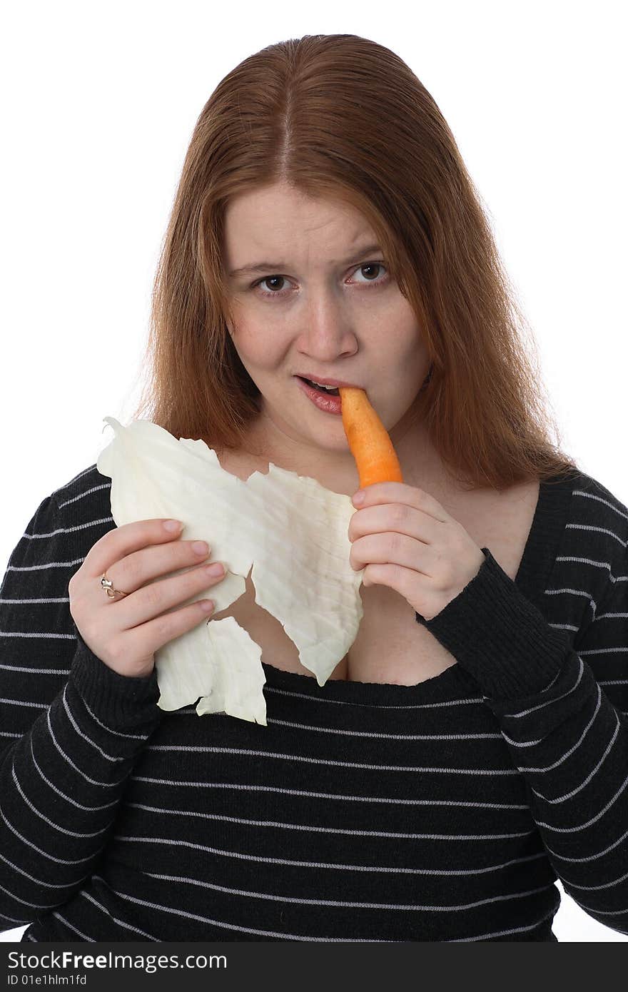 The young woman with carrots and cabbage sheet