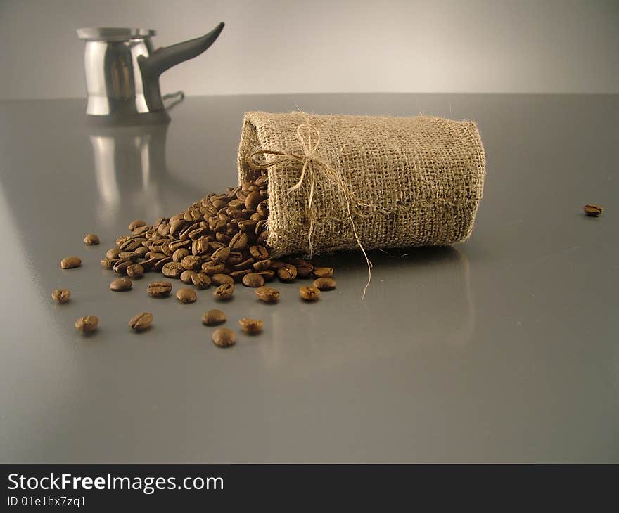 Turkish coffee pot and coffee beans. Turkish coffee pot and coffee beans