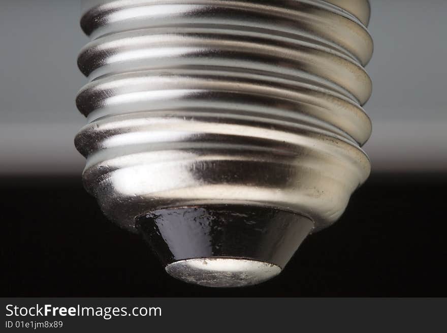 Macro close-up of a screw fitting of a light bulb