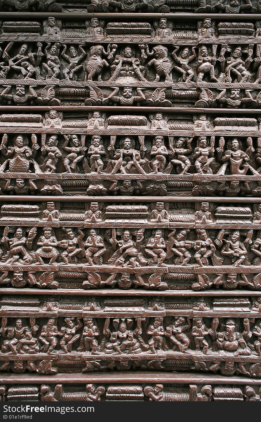 Wooden Hindu relief with dancing woman figure