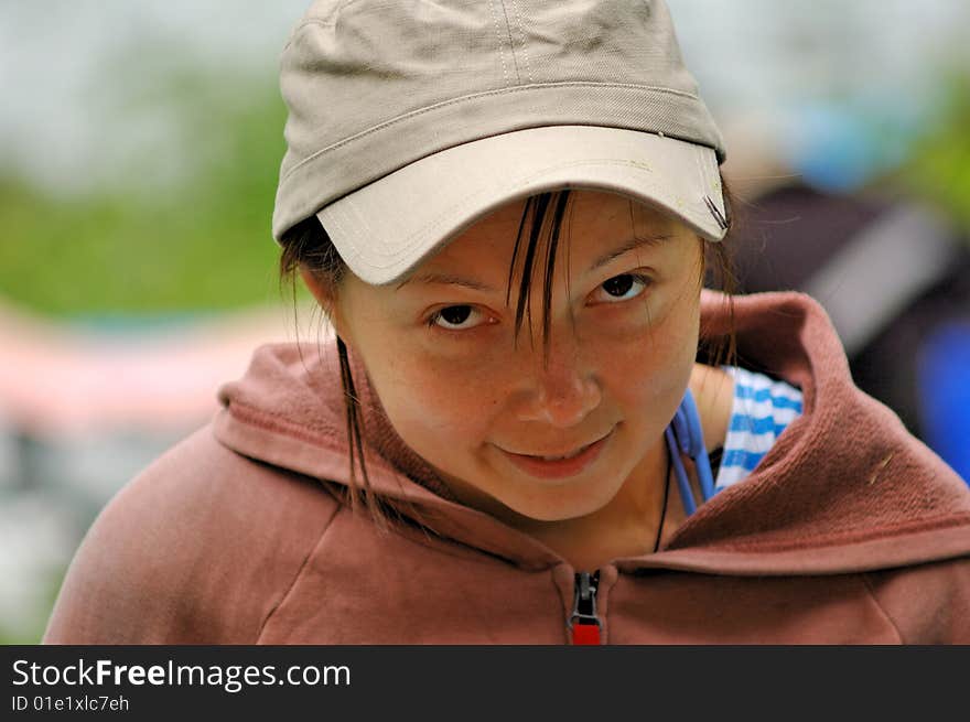 Portrait of a girl with cunning expression