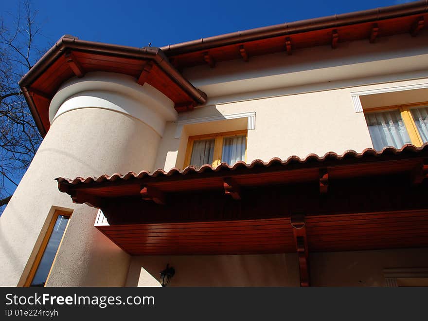 Mediterranean-style new home with blue sky