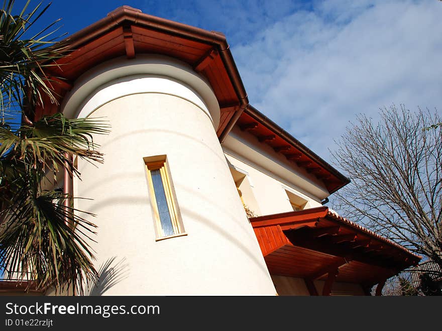 Mediterranean-style new home with blue sky