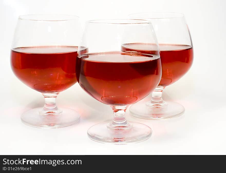 Three crystal wine-glassful with red wine