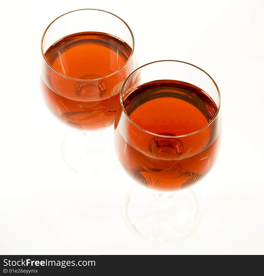 Two crystal wine-glassful with red wine