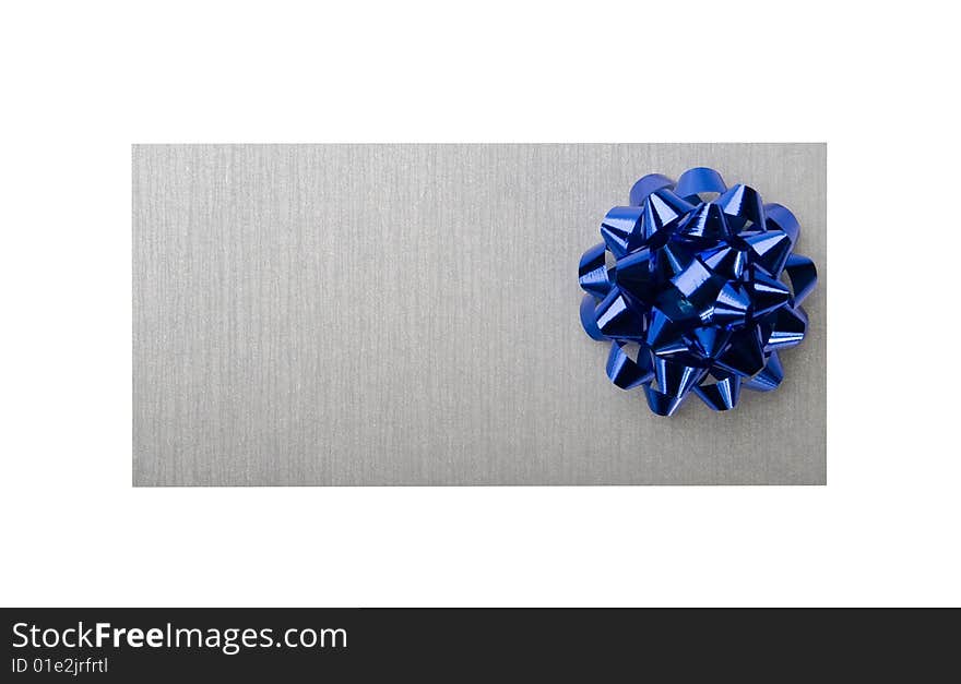 Silvery envelope with decoration blue bow on white background