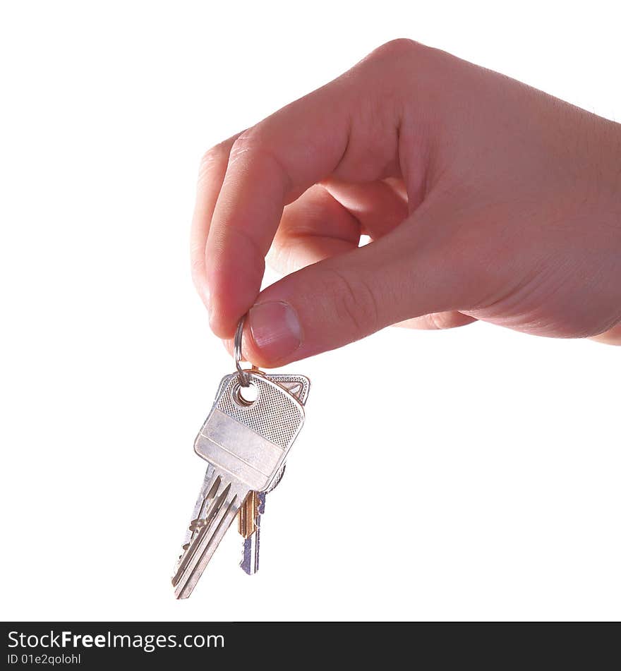 A hand is giving someone a bunch of keys. Isolated over white.